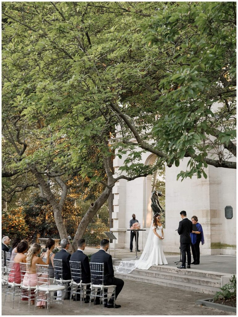 Intimate wedding ceremony set up in the gardens of the Rodin Museum in Philadelphia 