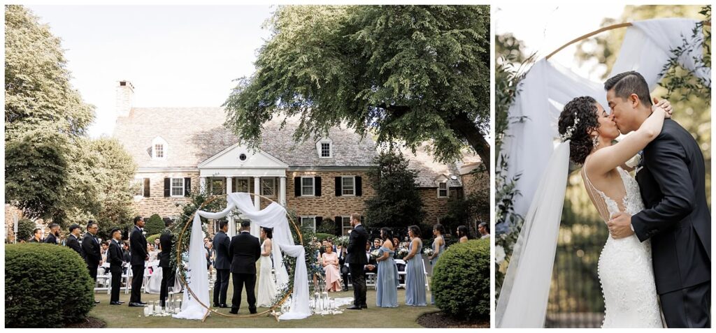 Bride and groom share their first kiss at their outdoor wedding ceremony in front of Philadelphia Country Club 